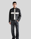 Full body view of Luca black and white leather racer jacket